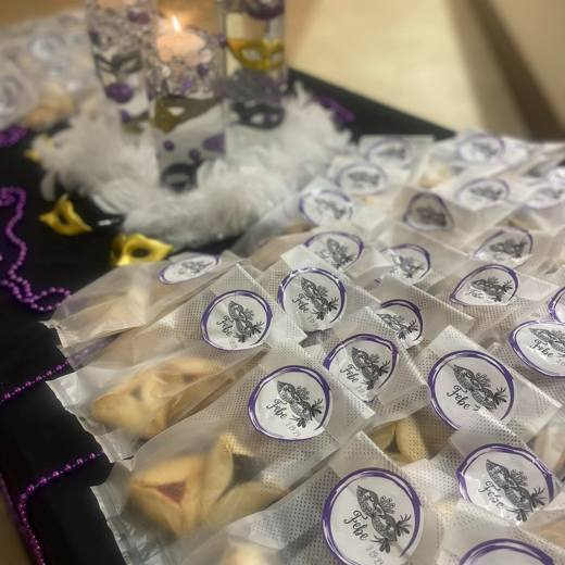 Masks and Mitzvah Magic: Purim masquerade. Mitzvah celebration at Chabad of Charlotte, planned by Razzle Dazzle Event Planning, Charlotte NC. Photo 6 of 7.