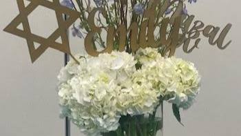 Bright Blues and Greens: Blue and green, bright and beautiful. Mitzvah celebration at Chabad of Charlotte, planned by Razzle Dazzle Event Planning, Charlotte NC. Photo 5 of 7.