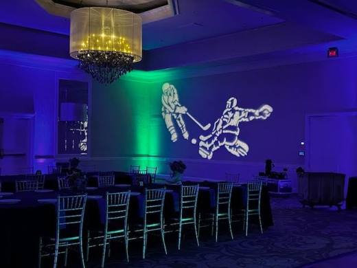 Hockey Meets Elegance: Hockey, with diamonds, purple and green. Bat Mitzvah at Le Méridien Charlotte, planned by Razzle Dazzle Event Planning, Charlotte NC. Photo 4 of 10.