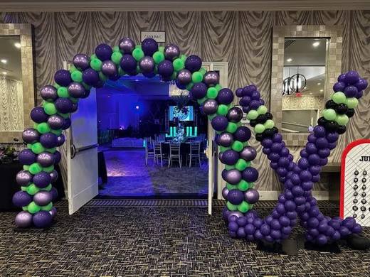 Hockey Meets Elegance: Hockey, with diamonds, purple and green. Bat Mitzvah at Le Méridien Charlotte, planned by Razzle Dazzle Event Planning, Charlotte NC. Photo 6 of 10.