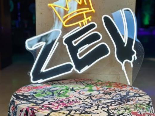 Zev's Graffiti Bar Mitzvah: Graffiti, lights and color. Bar Mitzvah at Temple Beth El, Charlotte, planned by Razzle Dazzle Event Planning, Charlotte NC. Photo 2 of 10.