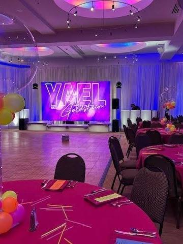 Yael's Glow Party: Let's GLOW. Bat Mitzvah at Temple Beth El, Charlotte, planned by Razzle Dazzle Event Planning, Charlotte NC. Photo 5 of 10.