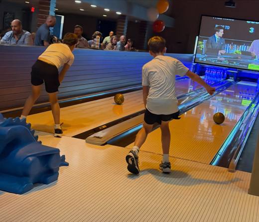Holden's Homerun: Baseball, with college football on the big screen. Bar Mitzvah at Spare Time Entertainment, Pineville, planned by Razzle Dazzle Event Planning, Charlotte NC. Photo 8 of 14.