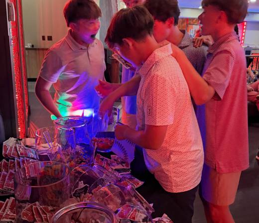 Holden's Homerun: Baseball, with college football on the big screen. Bar Mitzvah at Spare Time Entertainment, Pineville, planned by Razzle Dazzle Event Planning, Charlotte NC. Photo 10 of 14.