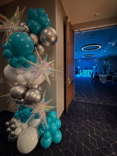 Lizzy's Bat Mitzvah: Teal, silver and white, with LIZZY in marquee lights. Bat Mitzvah at Marriott Waverly, Charlotte, planned by Razzle Dazzle Event Planning, Charlotte NC. Photo 3 of 14.